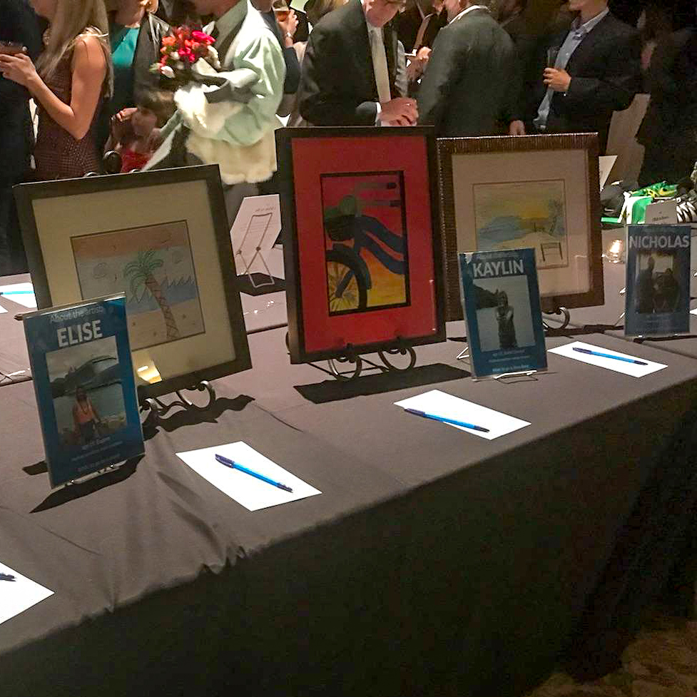 Artwork for auction from many of the Wish Kids!